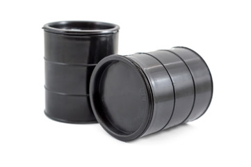 Two decorative black fuel oil barrel on white.