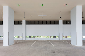 Modern empty parking garage interior in apartment or in supermarket.