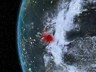 Tajikistan in red at night