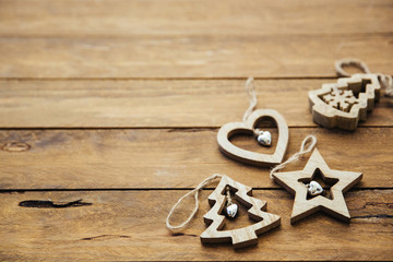 Christmas decorations over wooden background