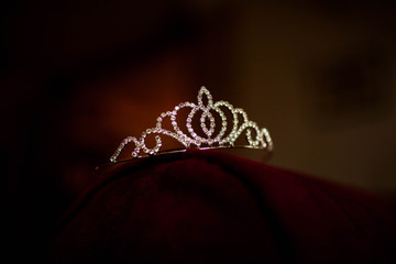 women's tiara lying on the table © Дмитрий Чапурин