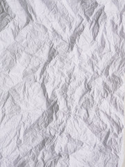 Texture of white crumpled paper. Paper background.