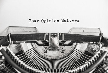 Text Your Opinion Matters typed on vintage typewriter retro. Close up