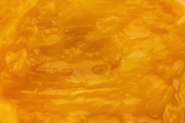 Fresh fruit macro background. Persimmon (background) background. Orange background