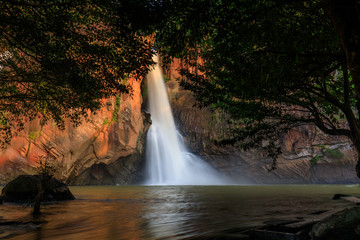Fototapeta na wymiar Chattrakan waterfall, Beautiful waterwall in Chattrakan nationalpark Pitsanulok province, ThaiLand.