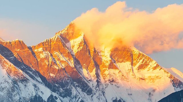 Timelapse of Golden Everest, Himalayas, landscape between way to Everest Base Camp,Nepal.Snow capped mountain top highest in the world.