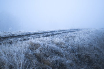 Winter landscape. Railway on a frosty morning.