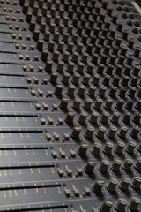 Obraz premium analogic mixer Panel with more cursor used to create music.