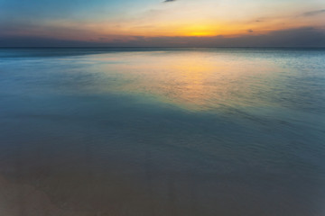 Tropical beach at sunset.