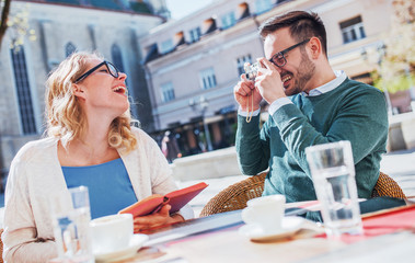 Young students on coffee break in the cafe. Love, dating, education, lifestyle