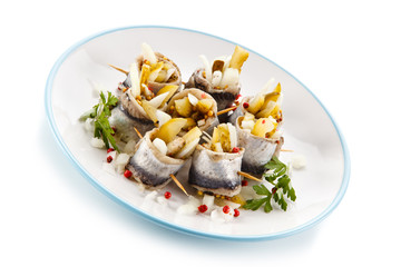 Marinated herring fillets on white background 