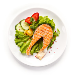 Grilled salmon on white background