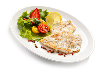     Fish dish - fried fish fillet and vegetables 