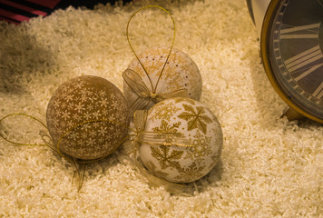 Christmas tree balls decoration on a white carpet