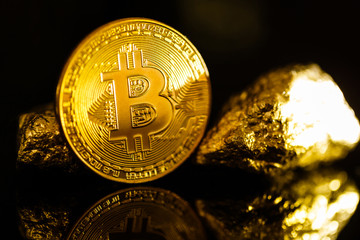 Golden bitcoin coin and mound of gold bitcoin cryptocurrency business concept 