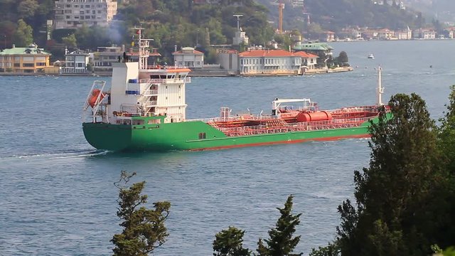 High angle view of Bosporus with the LPG tanker ship sailing past Istanbul. Strait just 700 meters across at its narrowest point and includes 12 sharp corners, some of them blind, which have been a so