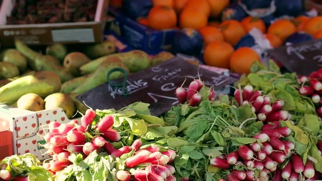 Fruits and vegetables stand at the farmers market place in Dieppe, France. Regional cuisine, natural healthy food and abundance concept