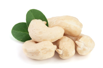cashew nuts with leaf isolated on white background. macro