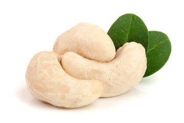 cashew nuts with leaf isolated on white background. macro