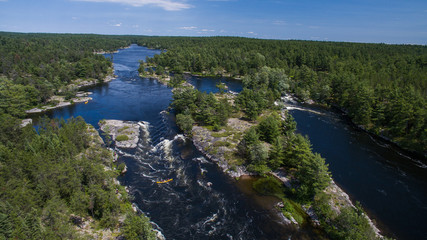 Aerial photo of a family whitewater canoe trip