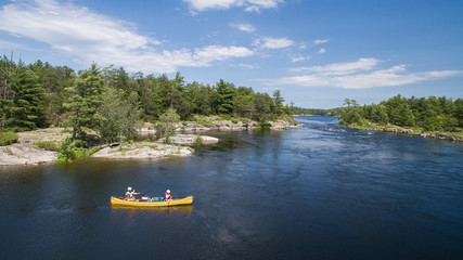 Aerial photo of a family whitewater canoe trip