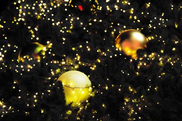 Light bright blurred bokeh and shiny ball at night , background, planets in galaxy for Christmas day ,New Year , greeting and celebrate season