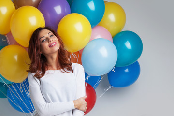 Happy woman with balloons