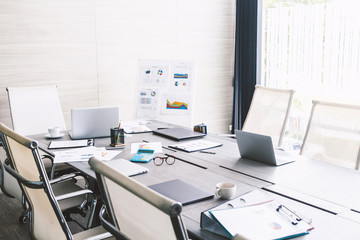Business meeting and conference room with laptop and business document