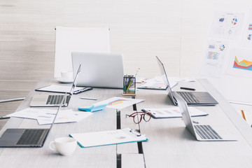 Business meeting and conference room with laptop and business document