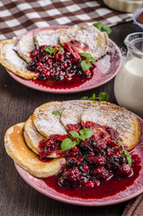 Crepes pancakes with berries reduction