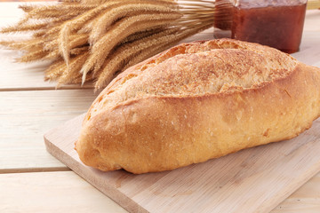 Bread on wooden background