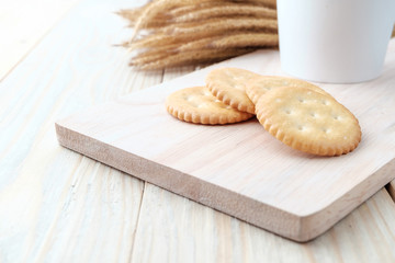 Cracker on woodden background