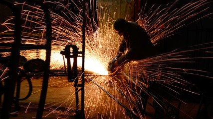Industrial worker with work tool