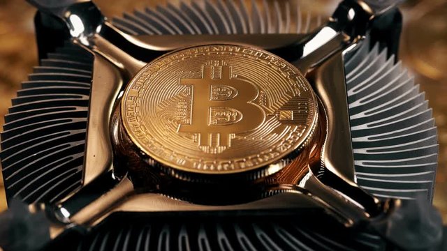 bitcoin is electronic currency mined by processing data on the computer - Powered by Adobe