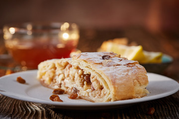 Apfelstrudel with raisins on a plate