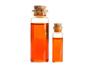 Two bottles  with oil isolated on white background