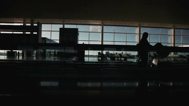 Barcelona, CIRCA Oktober 2017: Silhouettes of passengers at Barcelona airport.