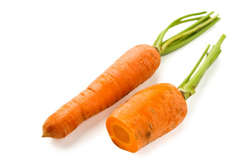 Ripe orange carrot half isolated at white