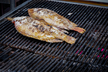 grill fish on the local market in thailand