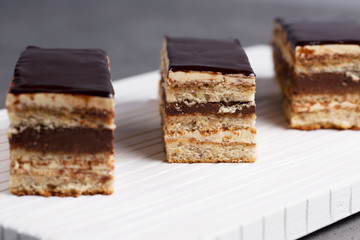 Cake Opera on a gray background, vertical, selective focus