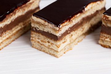 Cake Opera on a gray background, vertical, selective focus