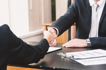 Handshake of business partners. partnership in business concept