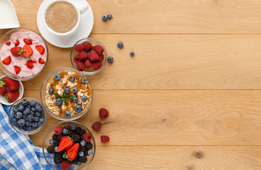 Rich breakfast on natural wooden table