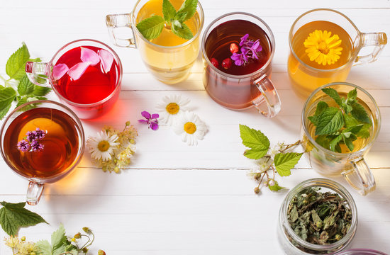 herbal tea in cups on a white background