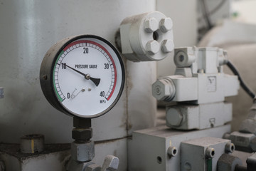 pressure gauge was mounted on the old machine, measuremant and equipment in the industry