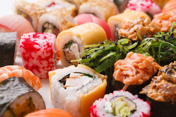 Set of sushi, maki and rolls background