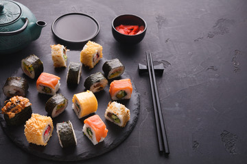 Sushi and rolls background, japanese cuisine