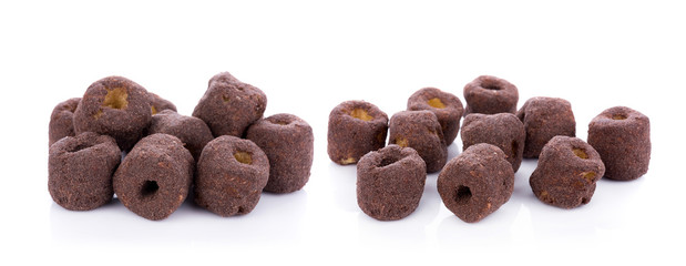 Crunchy corn chocolate snacks on a white background