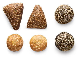 Fresh buns and rolls assortment at white background