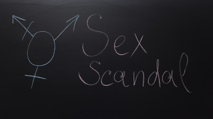 transgender Symbol with text written on blackboard: Sex Scandal